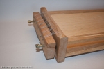 particular of chitarra fo making spaghetti, the wooden mobile part of the tool